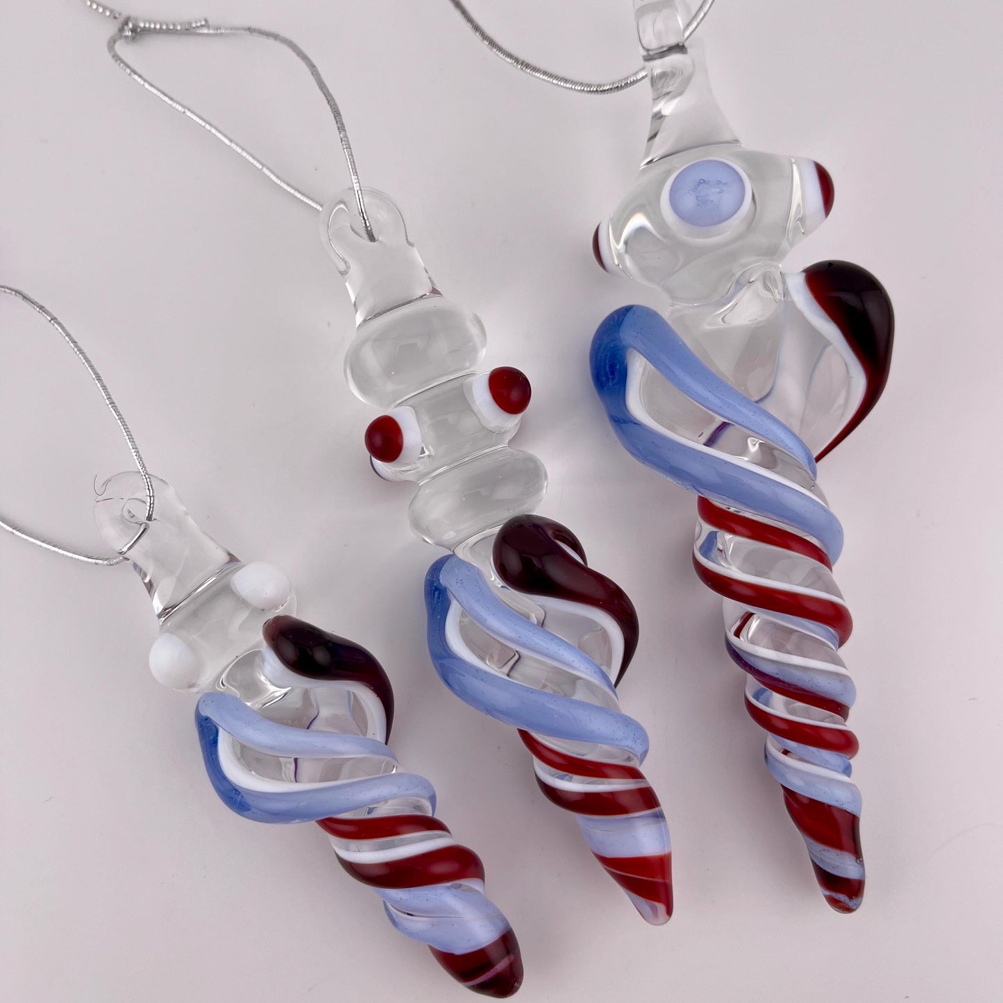 3 Pack of Elvis Red and Light Blue over Lotus White Glass Icicle Ornament Designs “Holiday Special” - JeffBeckerGlass.com