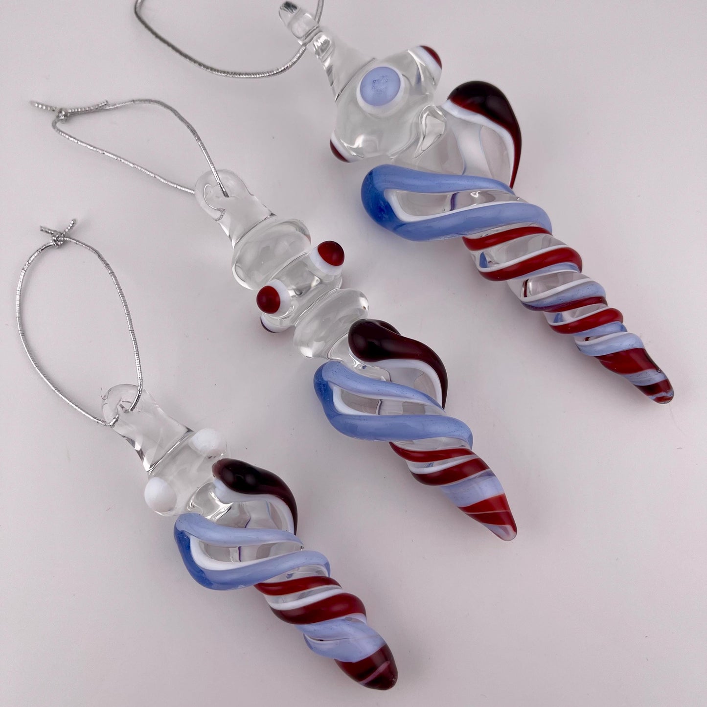 3 Pack of Elvis Red and Light Blue over Lotus White Glass Icicle Ornament Designs “Holiday Special” - JeffBeckerGlass.com