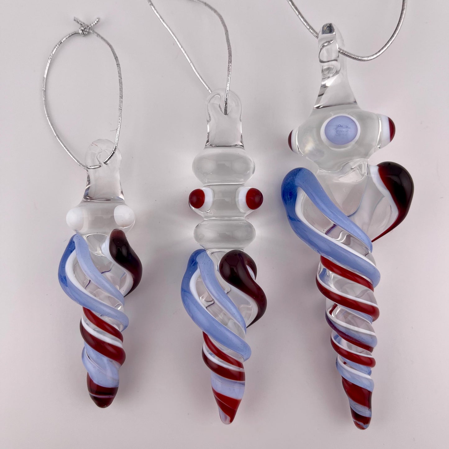 3 Pack of Elvis Red and Light Blue over Lotus White Glass Icicle Ornament Designs “Holiday Special” - JeffBeckerGlass.com