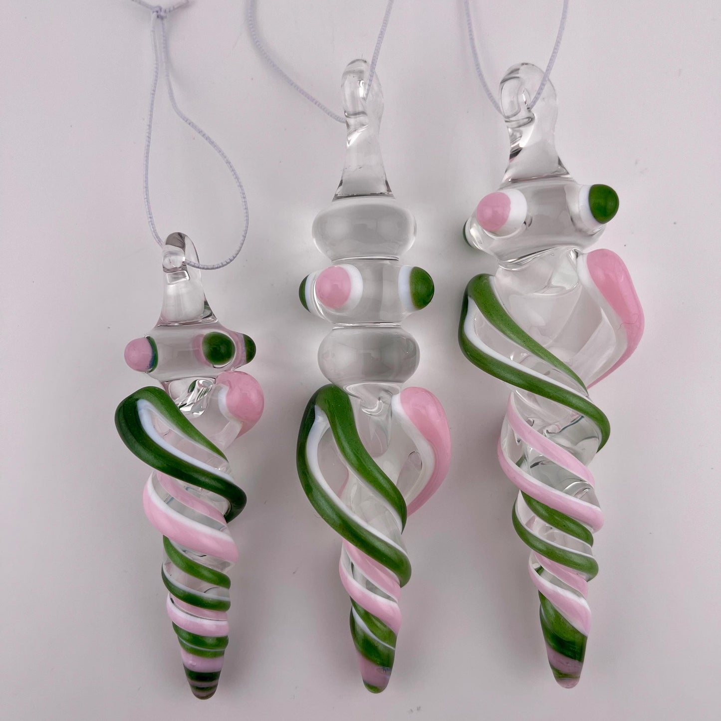 3 Pack of Pink and Sparkly Green over Lotus White Glass Icicle Ornament Designs “Holiday Special” - JeffBeckerGlass.com