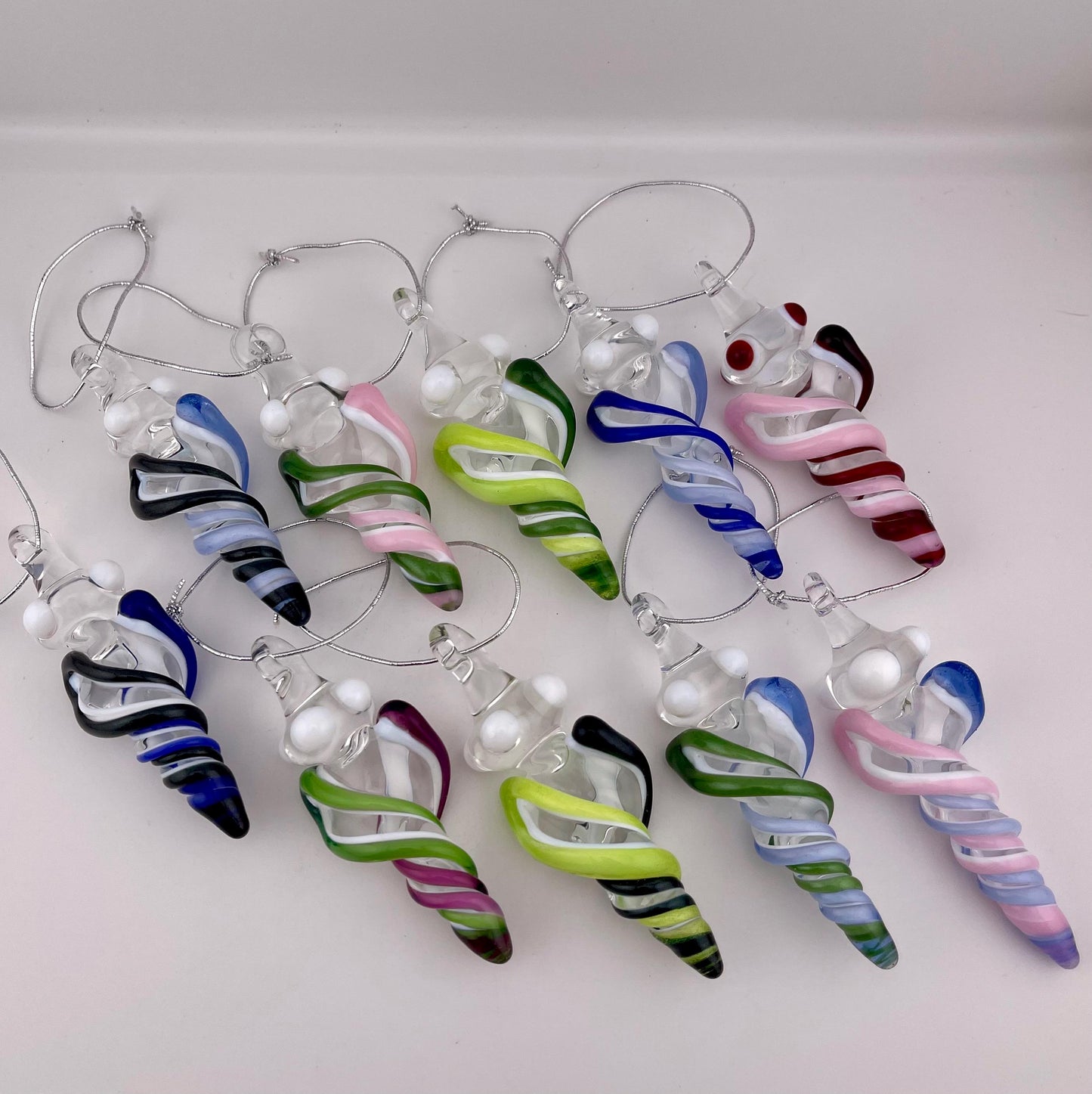 Mini Glass Icicle Ornament with Heavy Blue Leprechaun and Light Blue over Lotus White Color Twist - JeffBeckerGlass.com