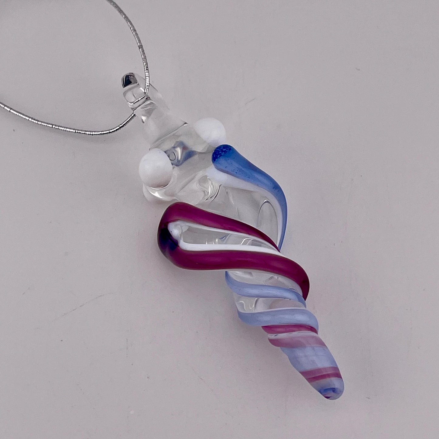 Mini Glass Icicle Ornament with Royal Jelly and Light Blue over Lotus White Color Twist - JeffBeckerGlass.com