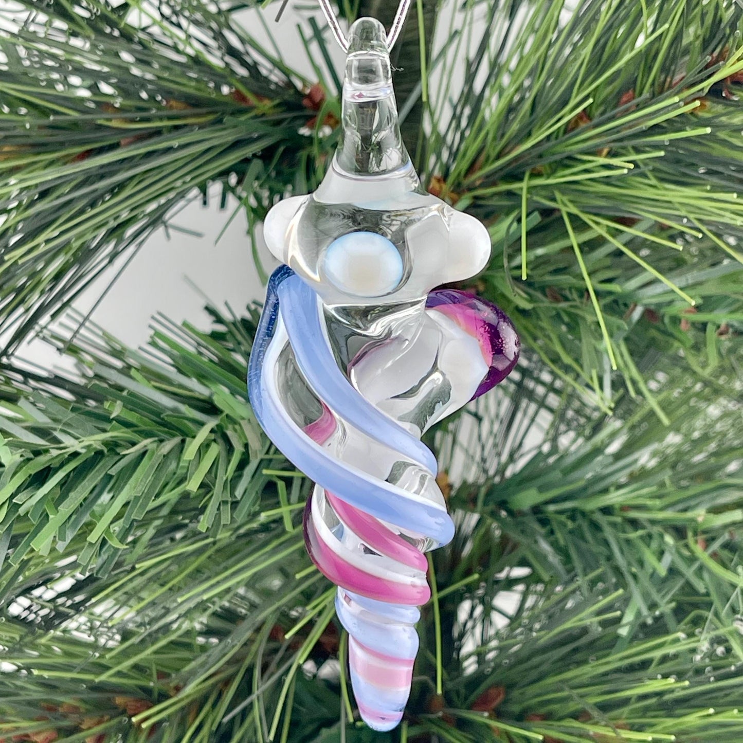 Mini Glass Icicle Ornament with Royal Jelly and Light Blue over Lotus White Color Twist - JeffBeckerGlass.com