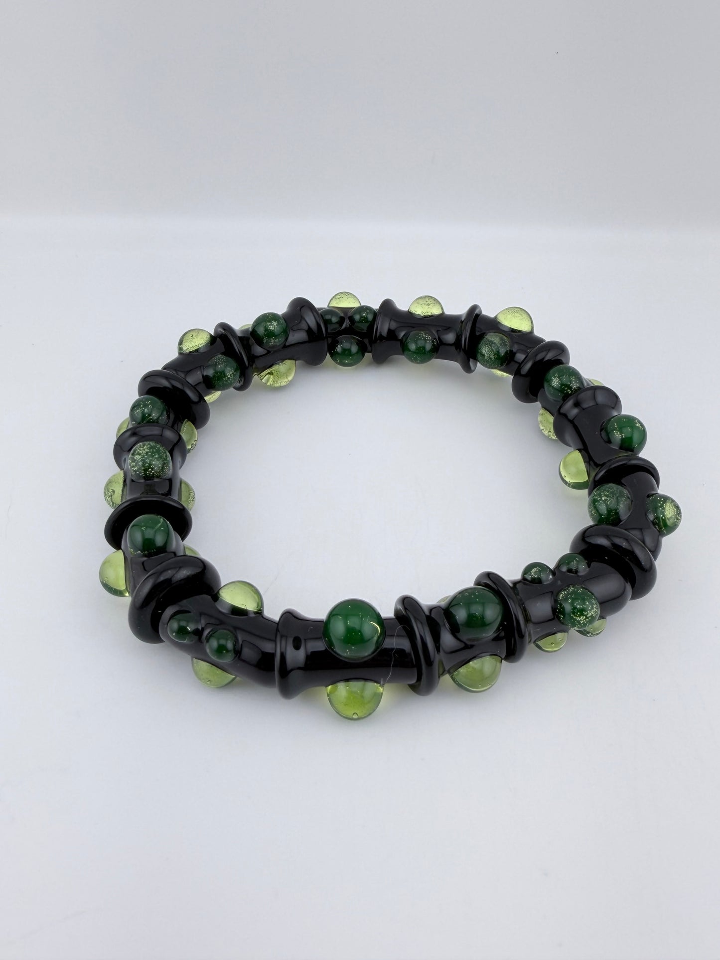 Black UV Reactive Green Dot Glass Bracelet – Glows Green Under Black Light - JeffBeckerGlass.com