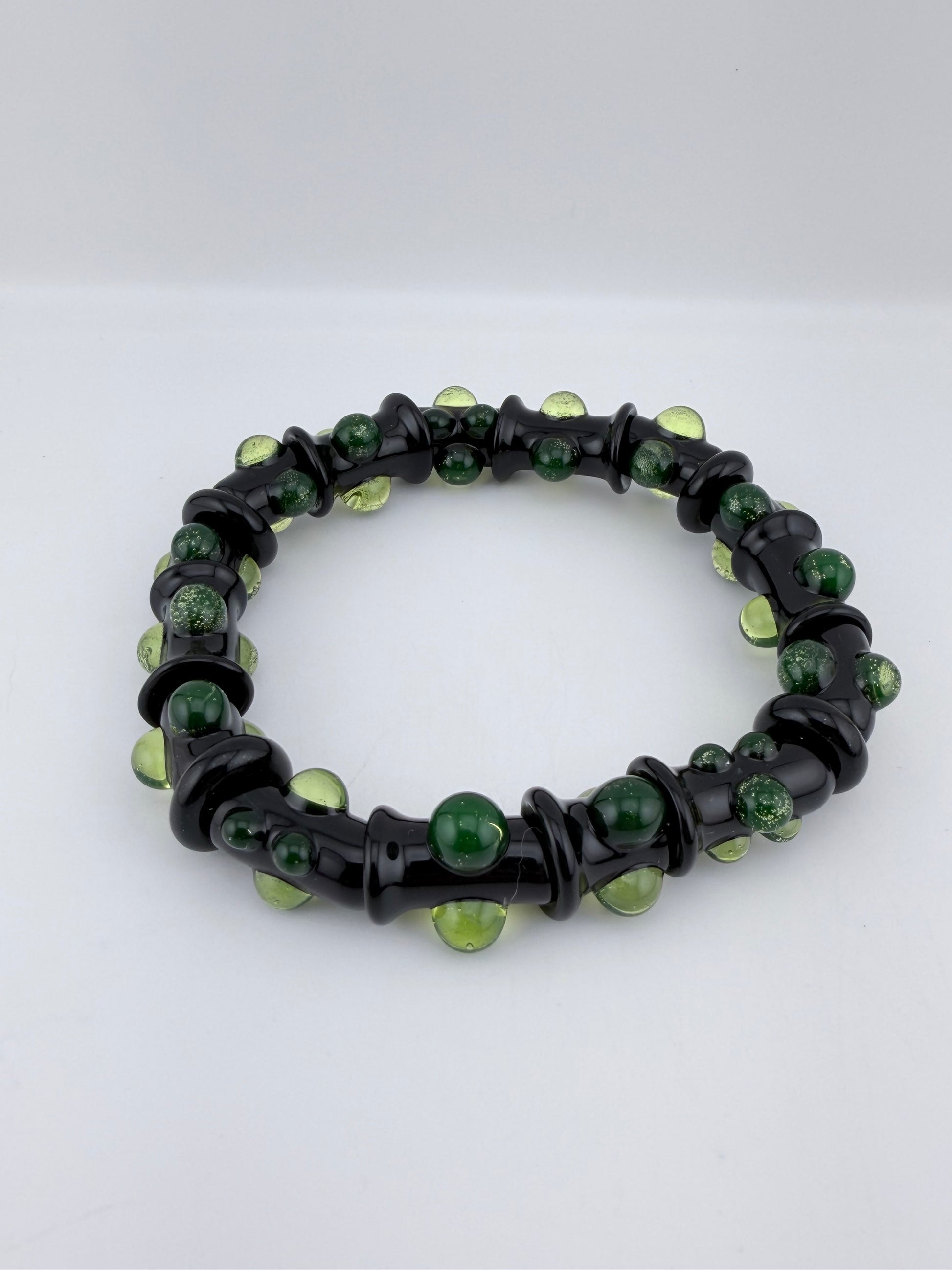 Black UV Reactive Green Dot Glass Bracelet – Glows Green Under Black Light - JeffBeckerGlass.com