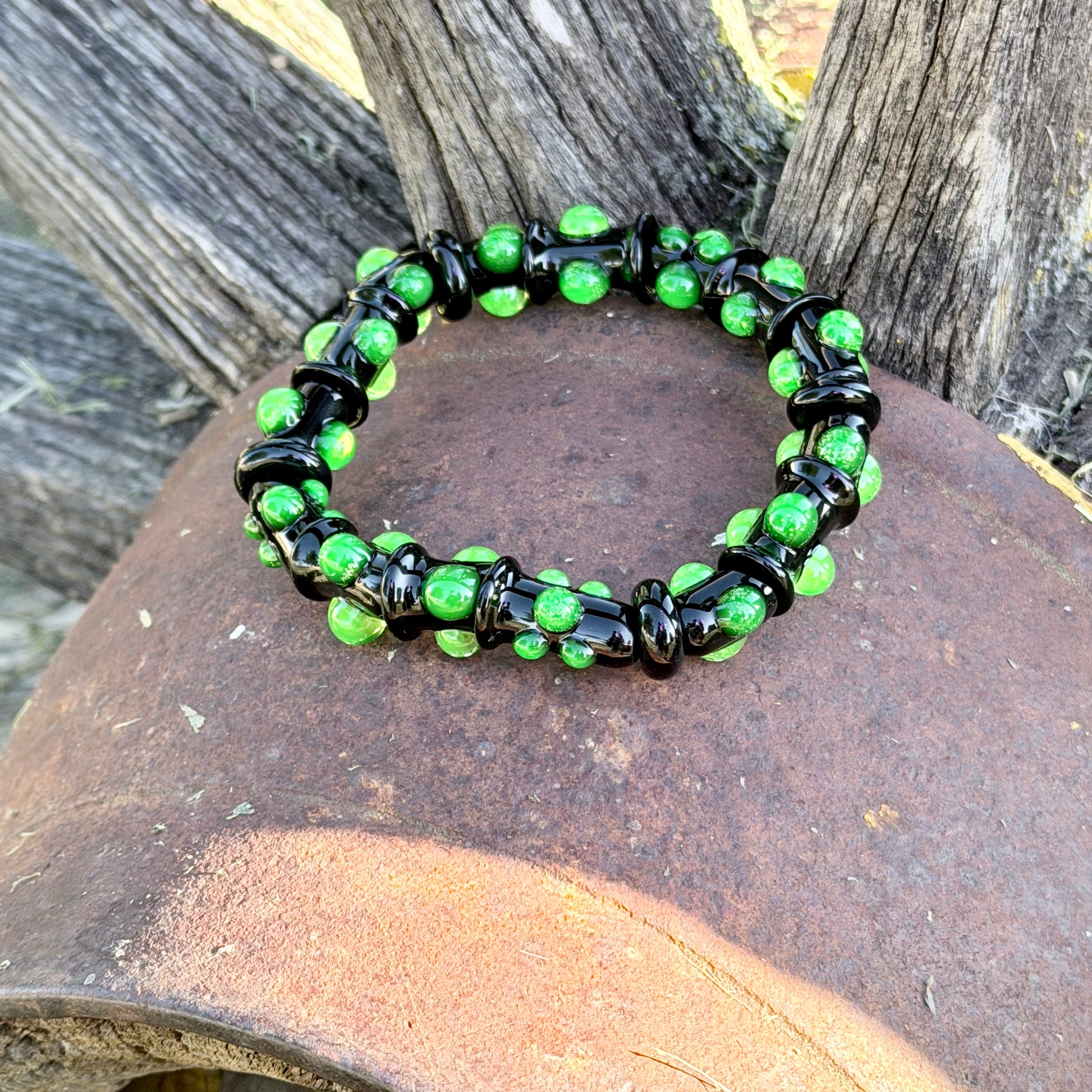 Black UV Reactive Green Dot Glass Bracelet – Glows Green Under Black Light - JeffBeckerGlass.com