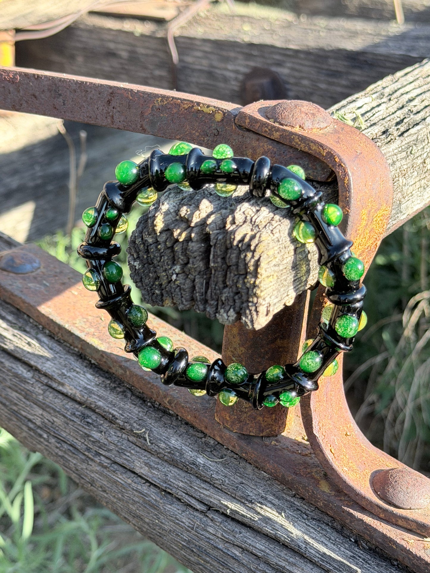 Black UV Reactive Green Dot Glass Bracelet – Glows Green Under Black Light - JeffBeckerGlass.com