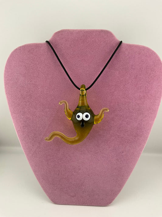 Citrine Glass Glow Ghost glows brightly under UV light. Pendant Necklace strung on black leather cord tied with adjustable hippie knots