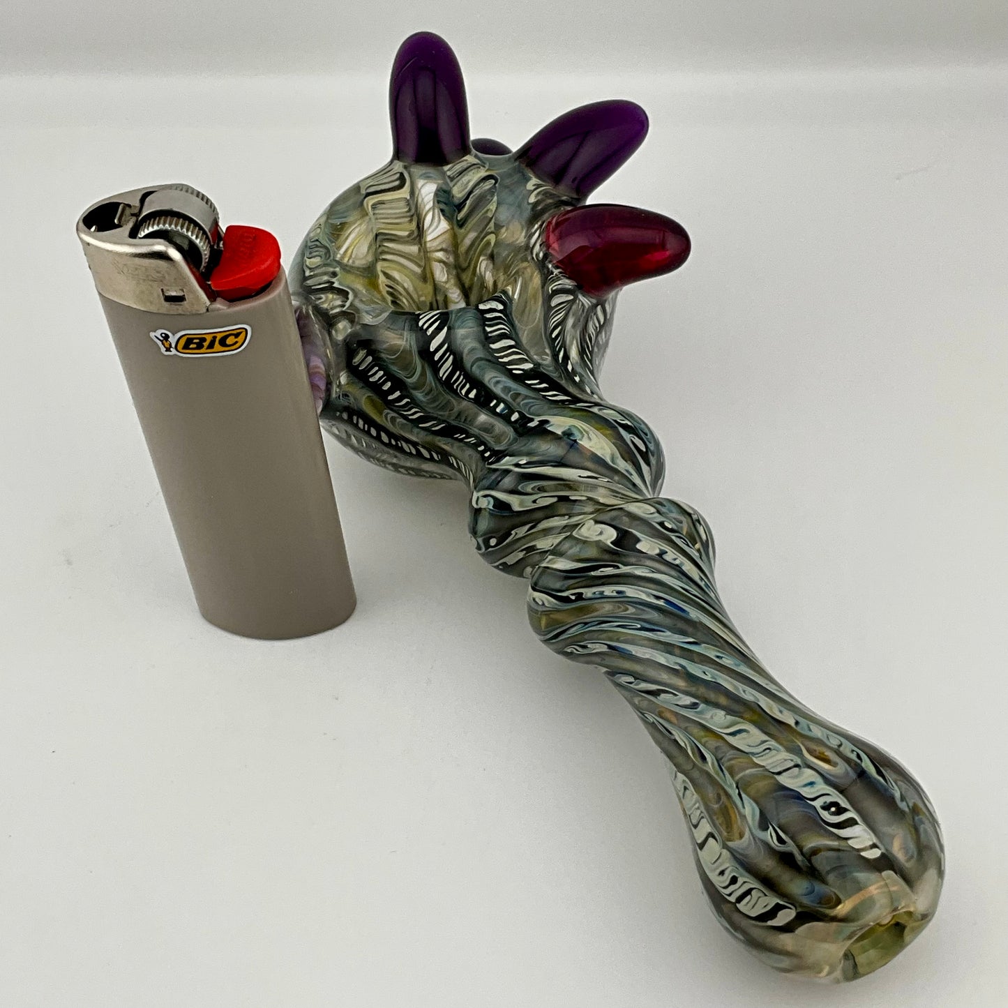 Wrap n Raked Black and Caramel Silver Fumed Spoon Pipe with light blue marbles