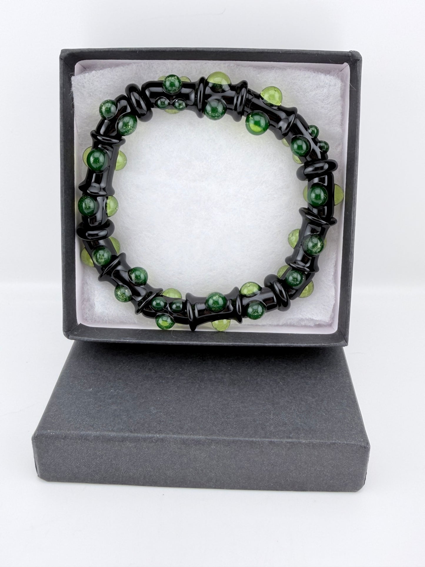 Black UV Reactive Green Dot Glass Bracelet – Glows Green Under Black Light - JeffBeckerGlass.com