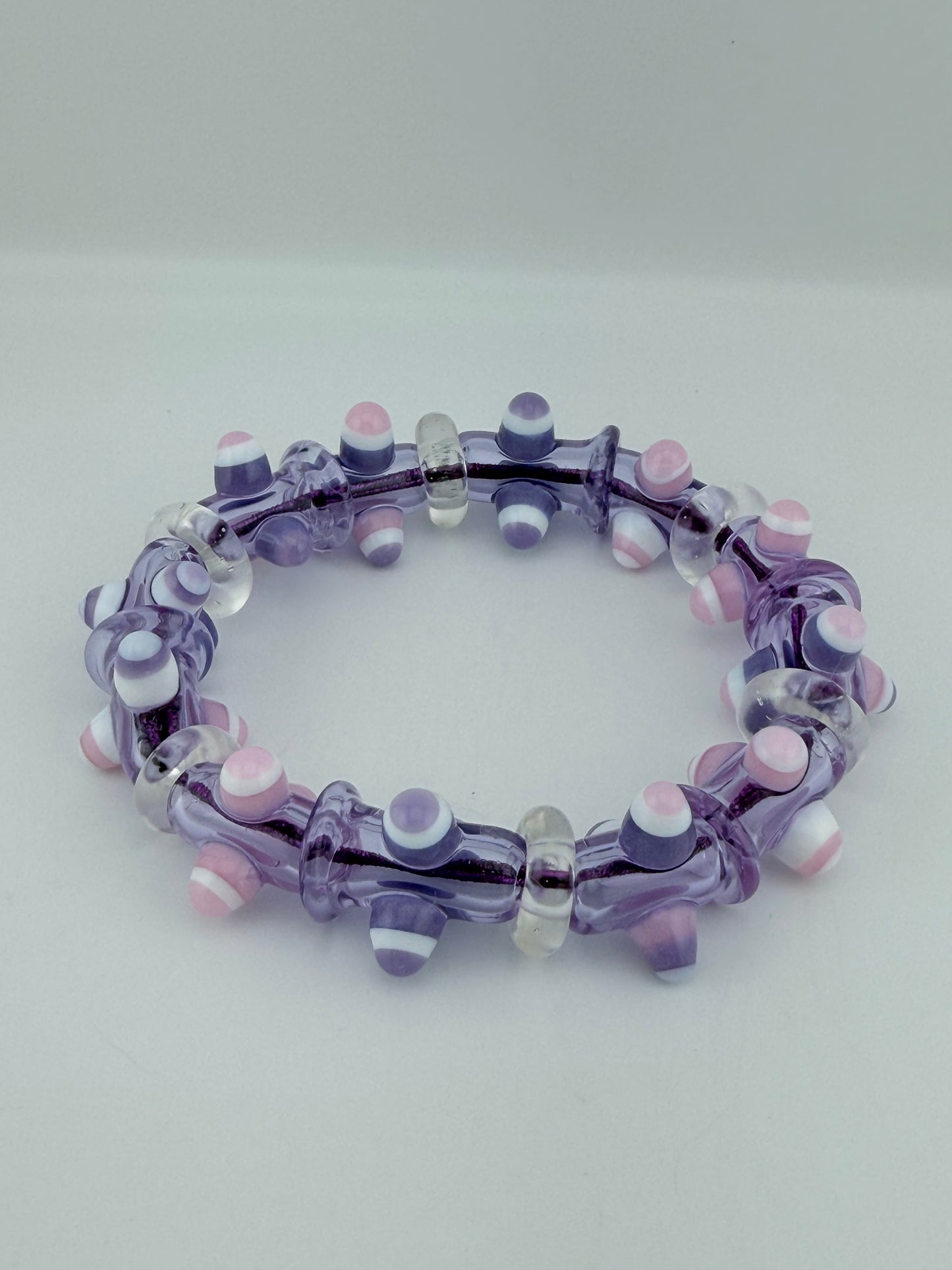 7inch Purple and Pink UV Reactive Glass Bracelet – Glows Pink Under Black Light