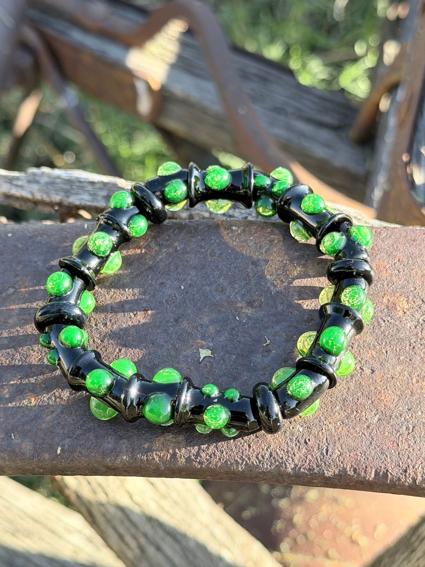 Black UV Reactive Green Dot Glass Bracelet – Glows Green Under Black Light - JeffBeckerGlass.com