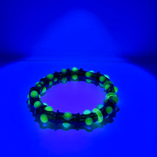 Stretchy Black Glass Bracelet with dots that Glow Bright Under Black Light - JeffBeckerGlass.com