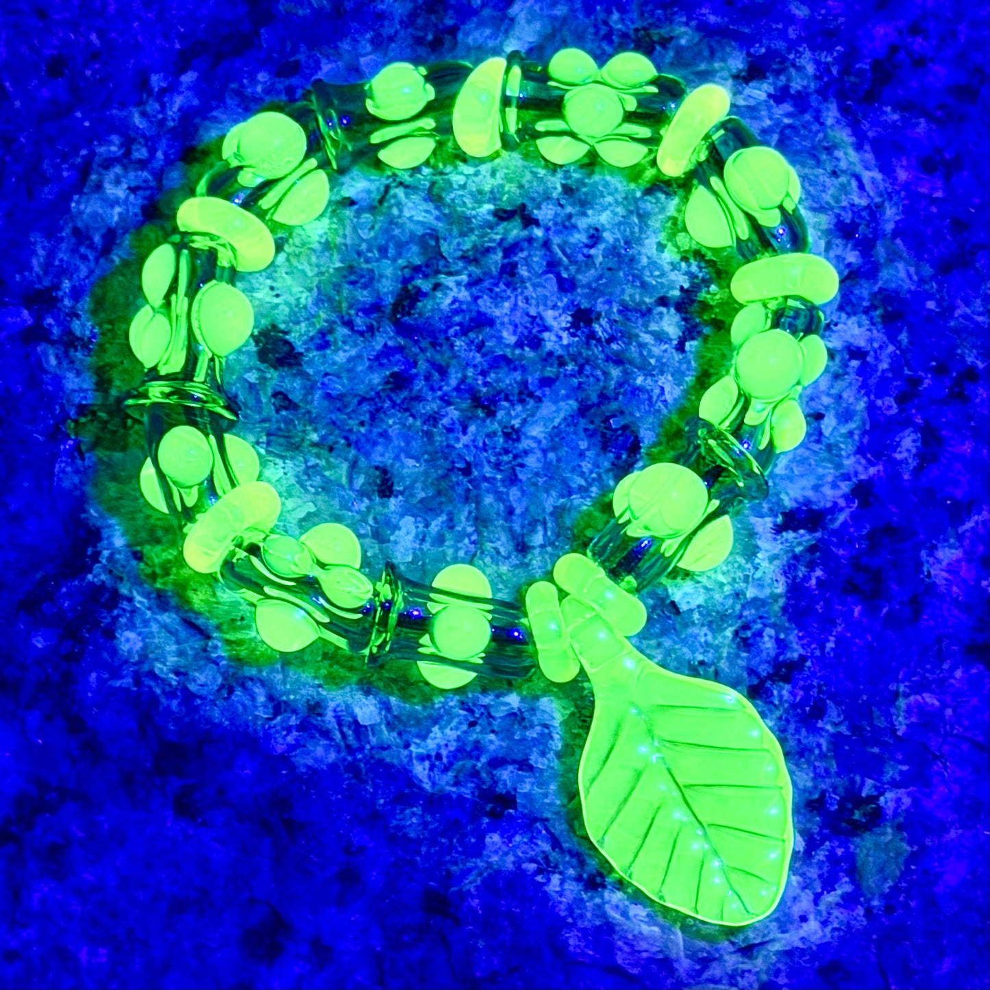 Stretchy  Green Glass Bracelet with leaf and dots that Glow Bright Green Under Black Light