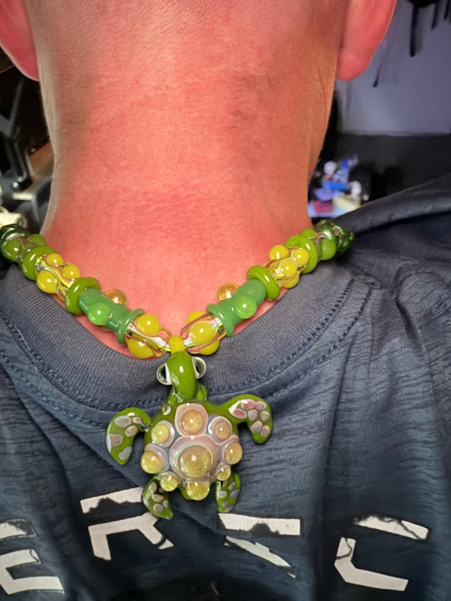 Stretchy Jade Green Glass Necklace with Turtle and dots that Glow Bright Green Under Black Light
