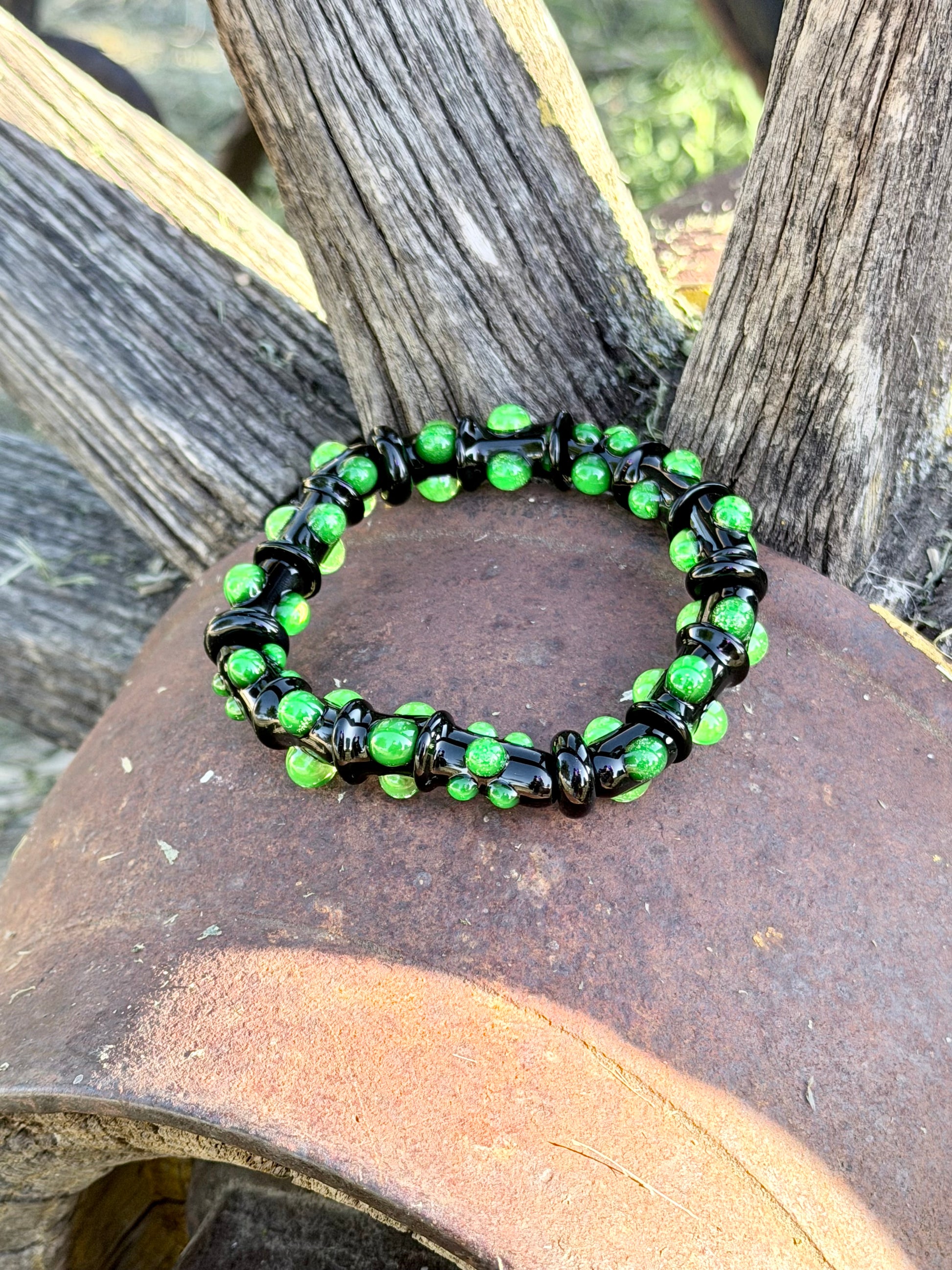 Black UV Reactive Green Dot Glass Bracelet – Glows Green Under Black Light - JeffBeckerGlass.com