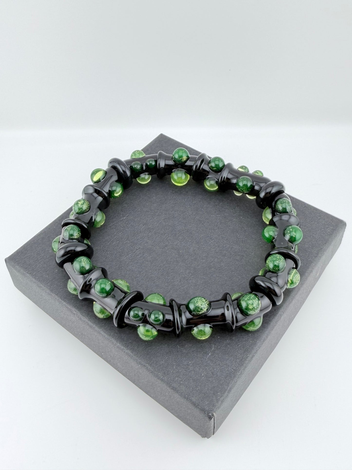 Black UV Reactive Green Dot Glass Bracelet – Glows Green Under Black Light - JeffBeckerGlass.com