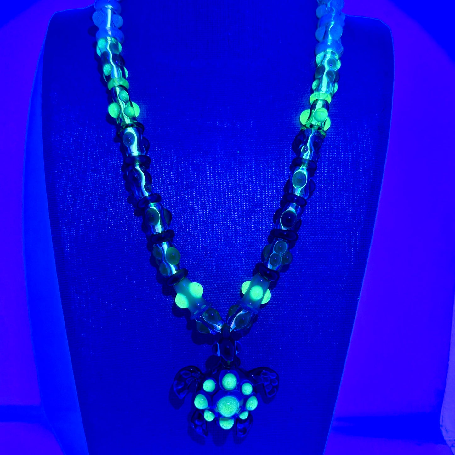 Stretchy Jade Green Glass Necklace with Turtle and dots that Glow Bright Green Under Black Light