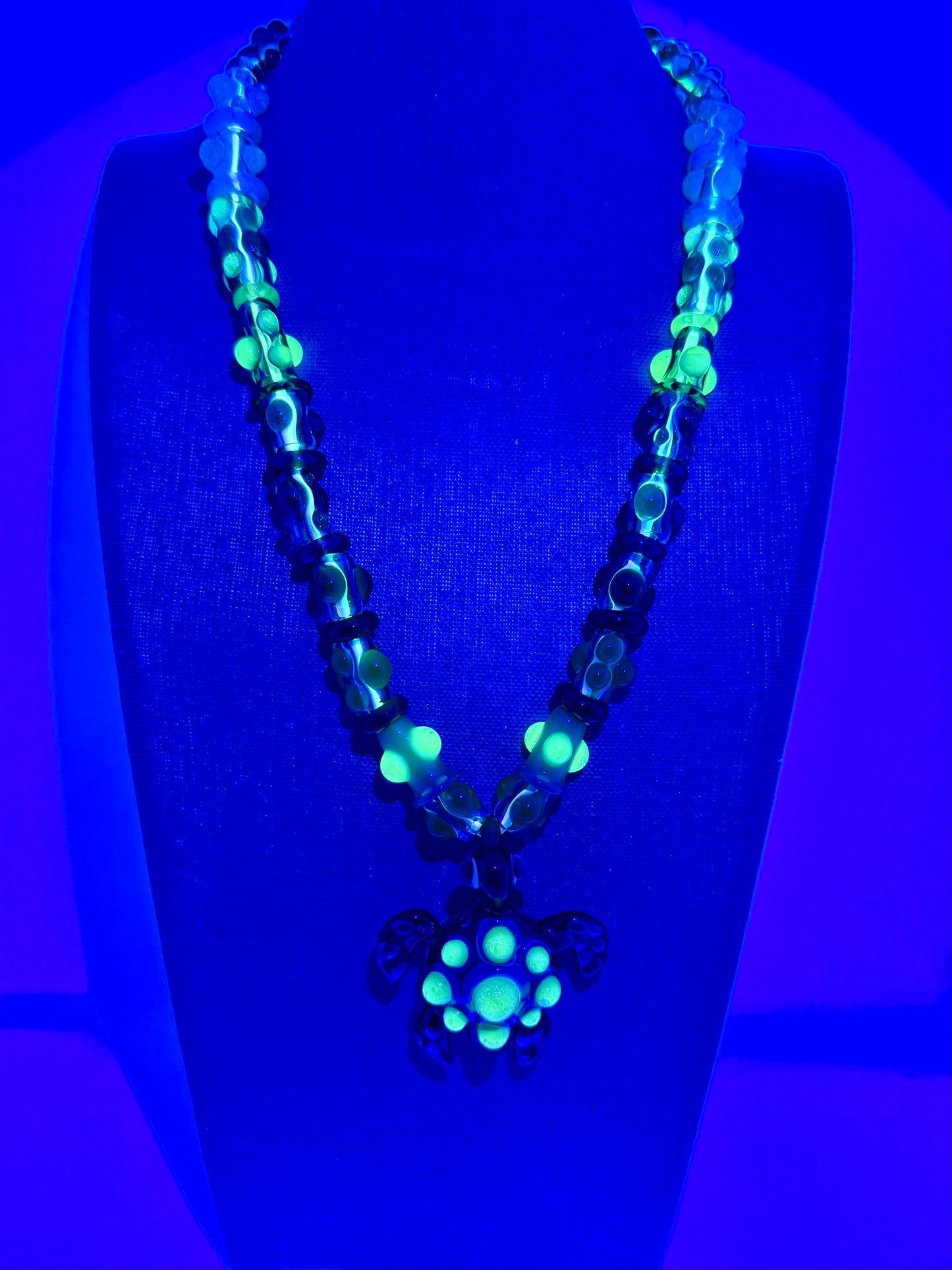 Stretchy Jade Green Glass Necklace with Turtle and dots that Glow Bright Green Under Black Light