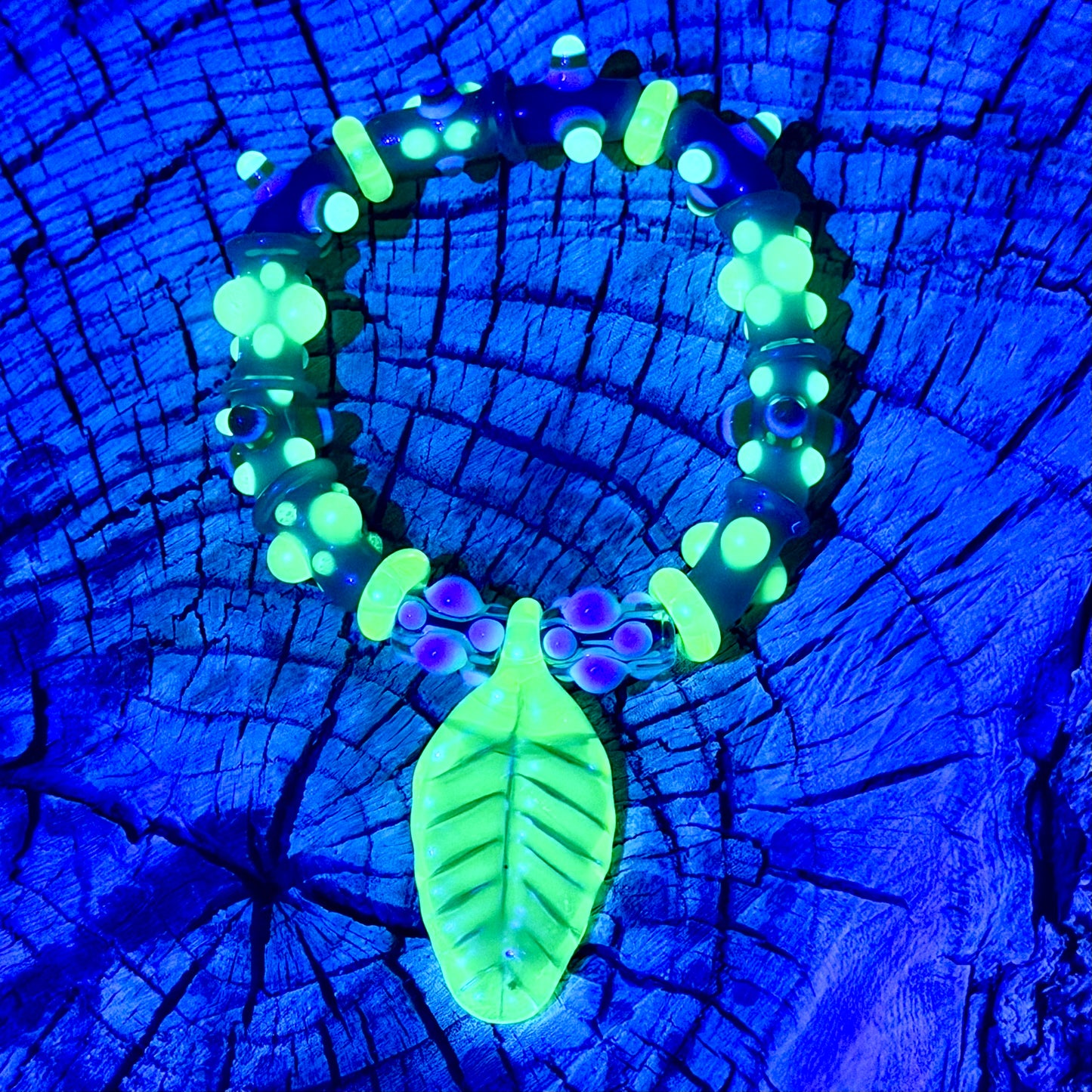 Stretchy Jade Green Glass Bracelet with leaf and dots that Glow Bright Green Under Black Light