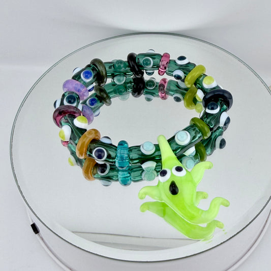 Stretchy Blue/Green and Rainbow dot Glass Bracelet with Ghost Pendant - JeffBeckerGlass.com