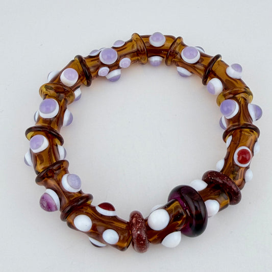 Stretchy Amber Glass Bracelet with purple and white accent dots (Not UV Reactive) - JeffBeckerGlass.com