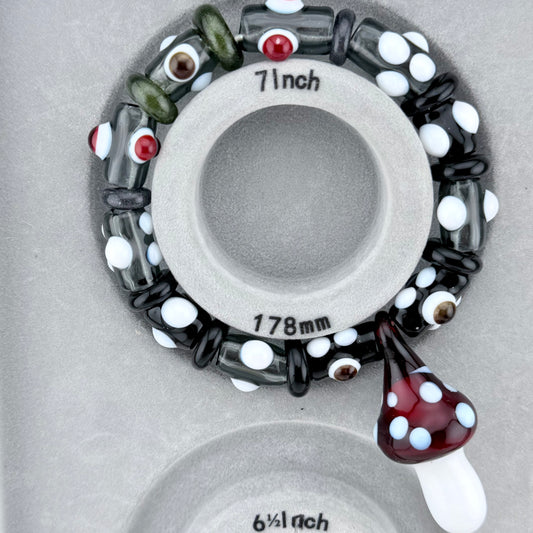 Stretchy Black And Grey Glass Bracelet with mushroom pendant (Not UV Reactive) - JeffBeckerGlass.com