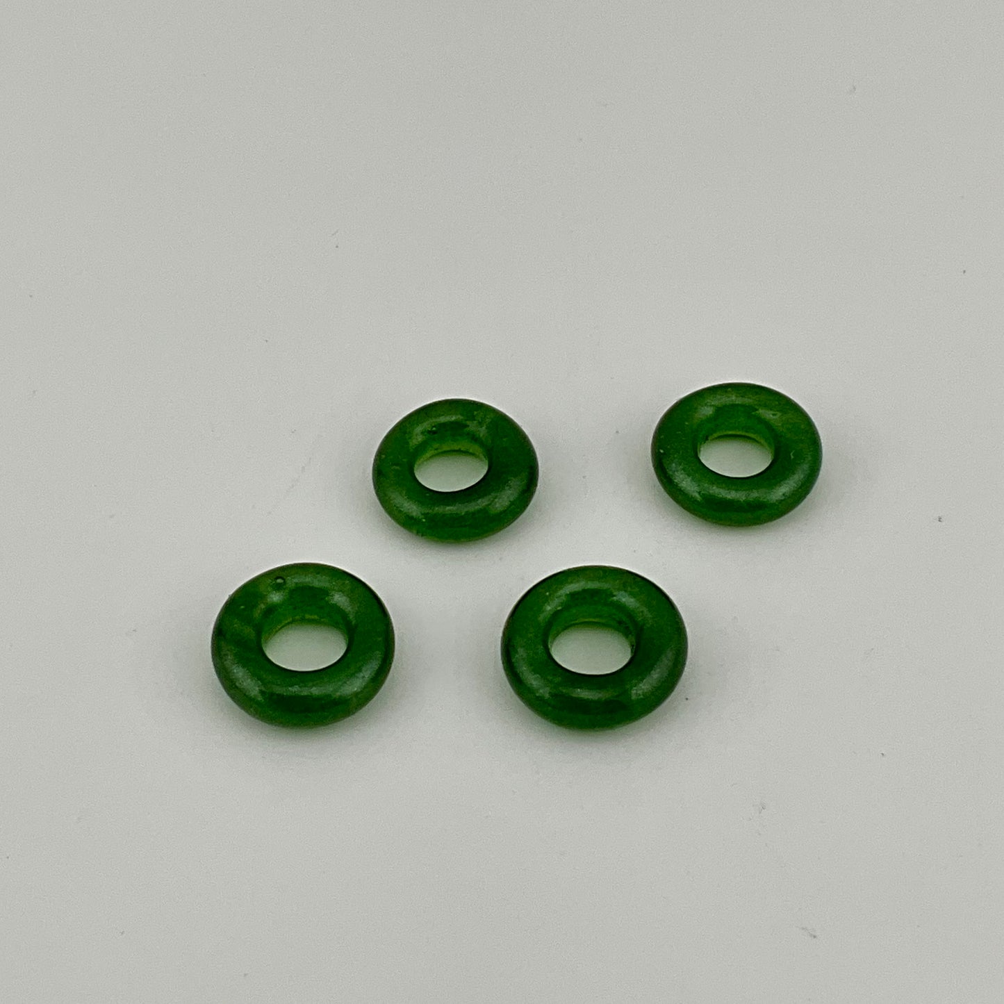 4 Sparkly Green Glass Spacer Beads