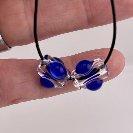 2 Clear beads with Blue marbles
