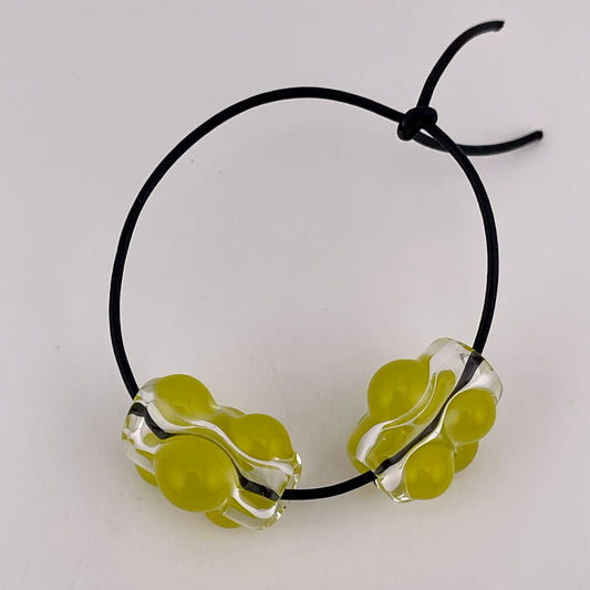 Clear Glass Barrel Bead with Yellow Green Marbles