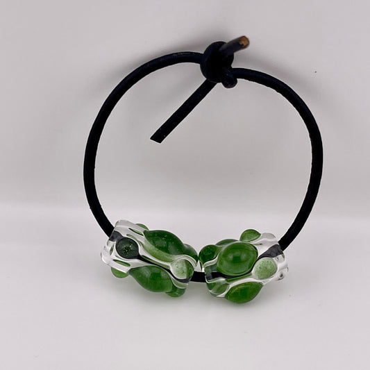 Clear Glass Barrel Bead with Sparkly Green Marbles
