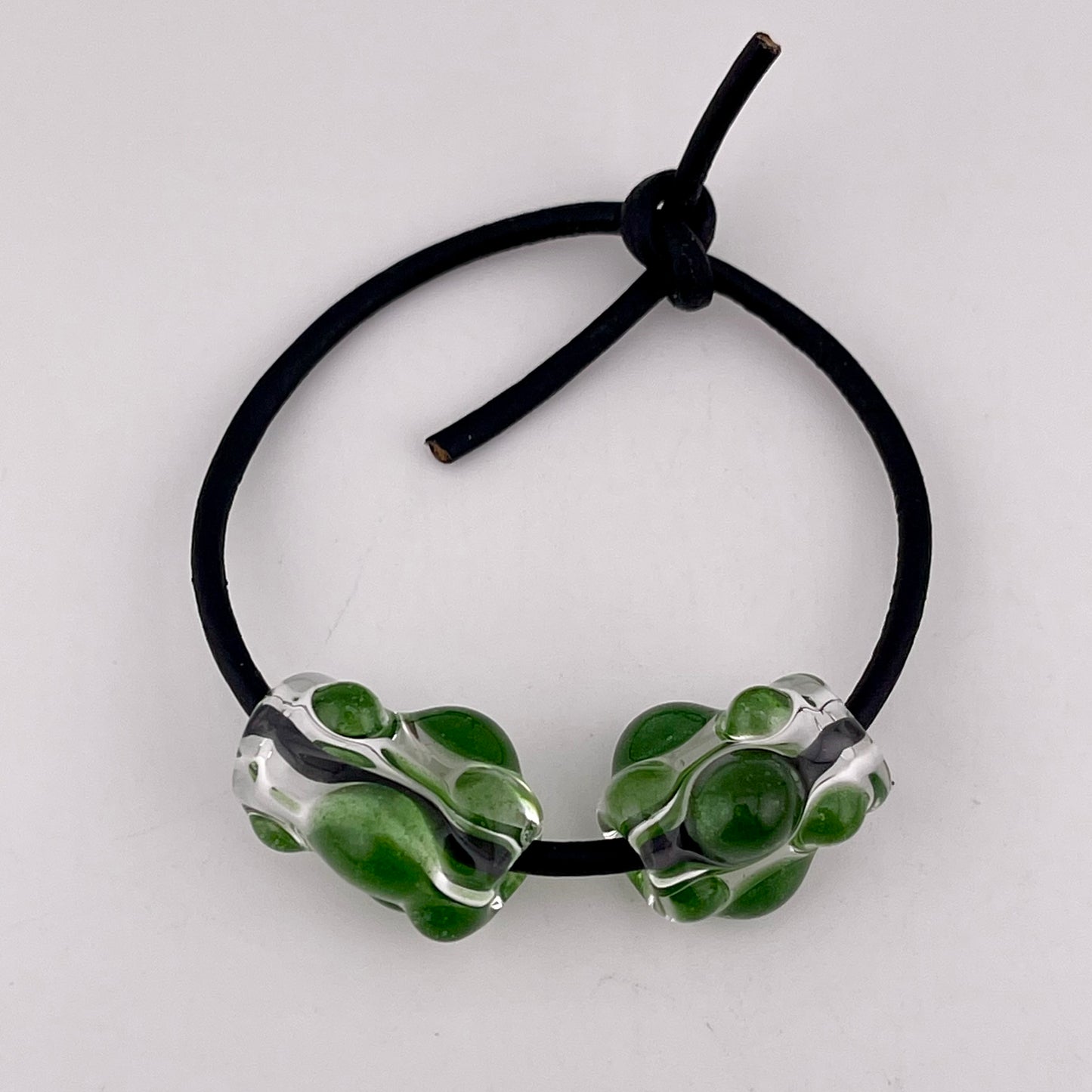 Clear Glass Barrel Bead with Sparkly Green Marbles