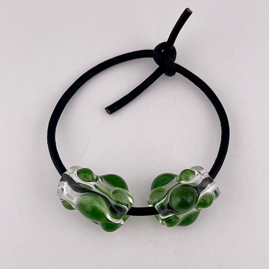 Clear Glass Barrel Bead with Sparkly Green Marbles