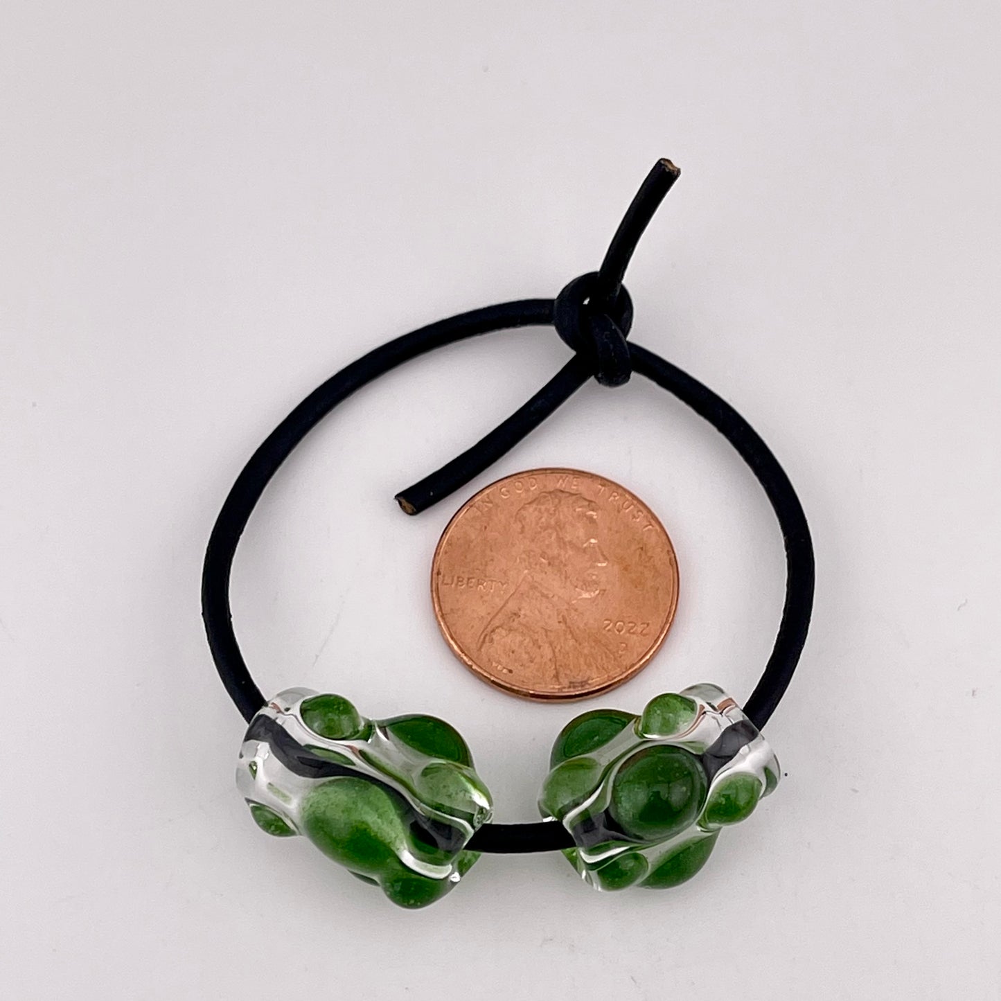 Clear Glass Barrel Bead with Sparkly Green Marbles