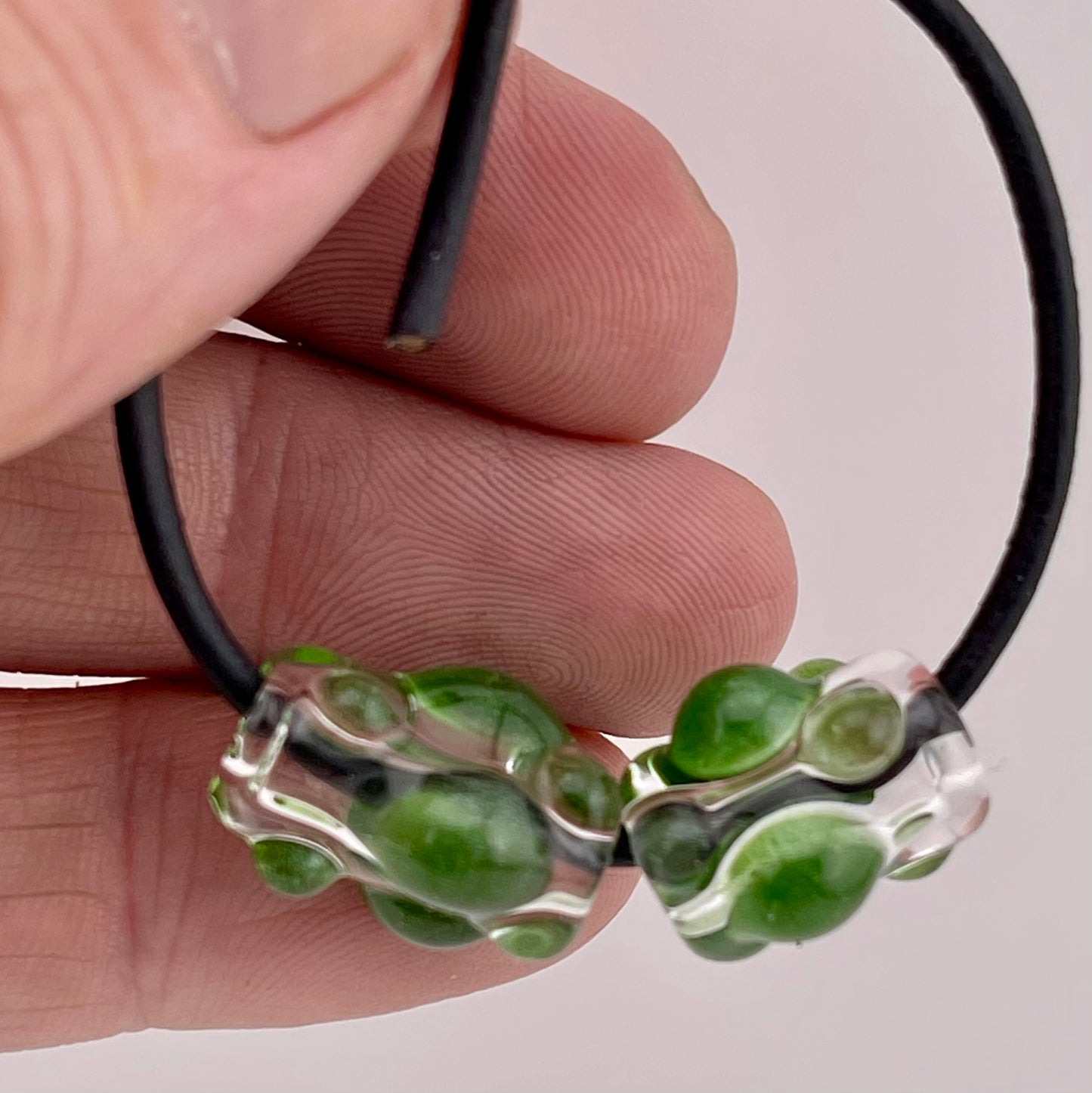Clear Glass Barrel Bead with Sparkly Green Marbles