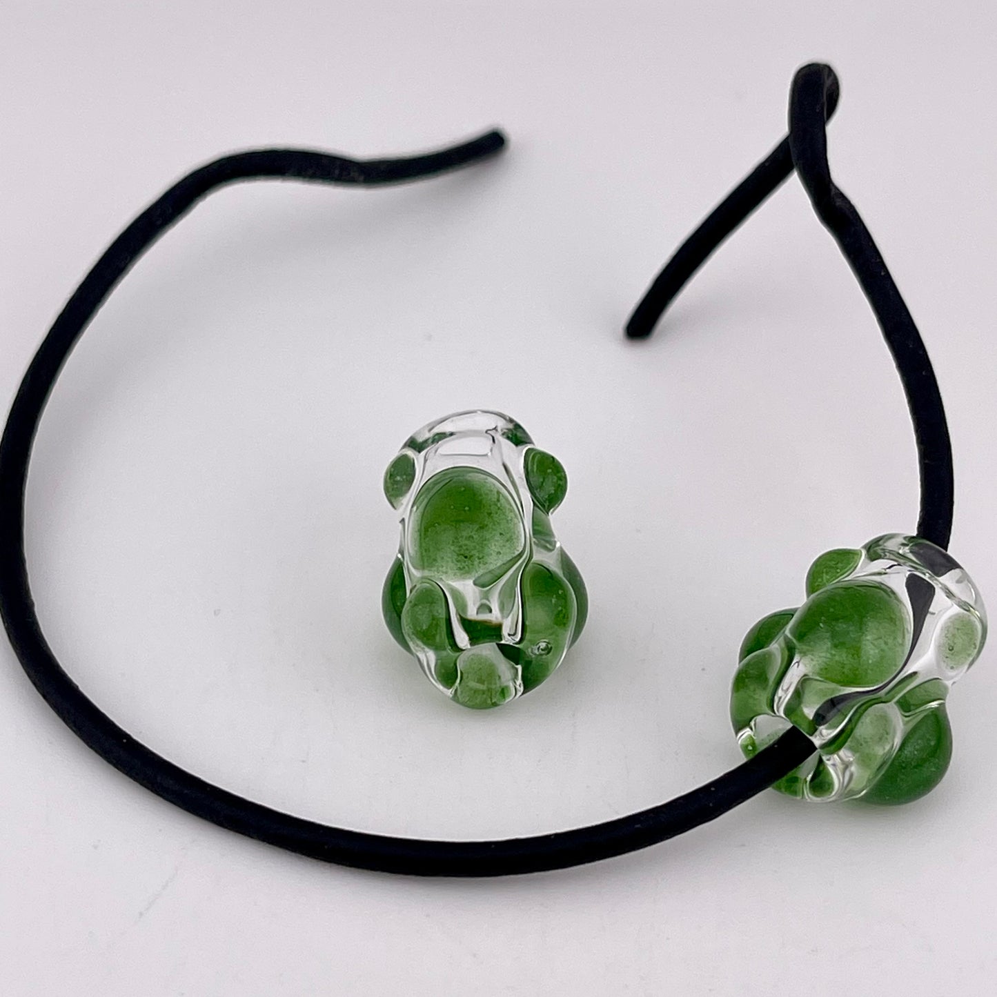 Clear Glass Barrel Bead with Sparkly Green Marbles