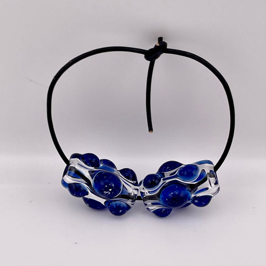Clear Glass Barrel Bead with Blizzard Blue Marbles