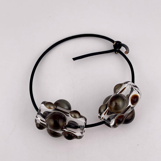 Clear Glass Barrel Bead with Golden Bronze Marbles