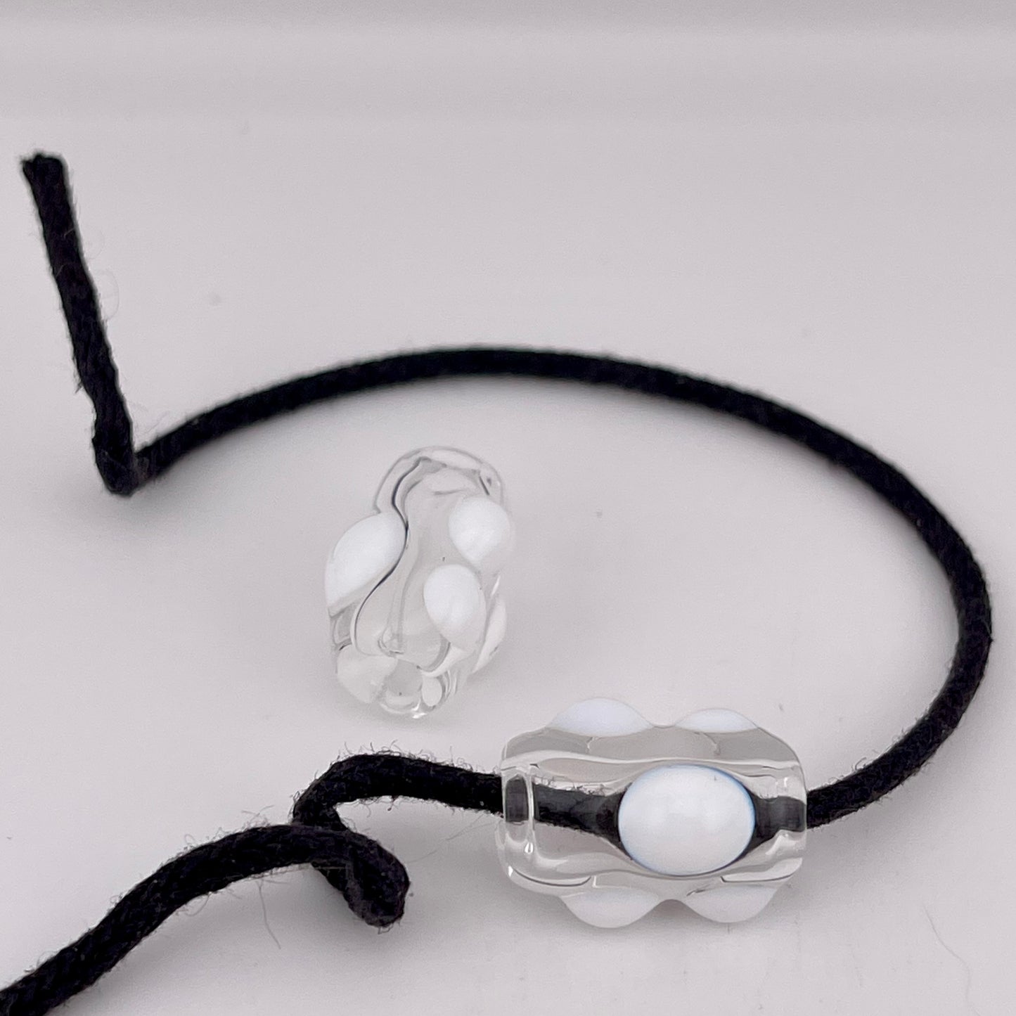 Clear Glass Barrel Bead with White Marbles white